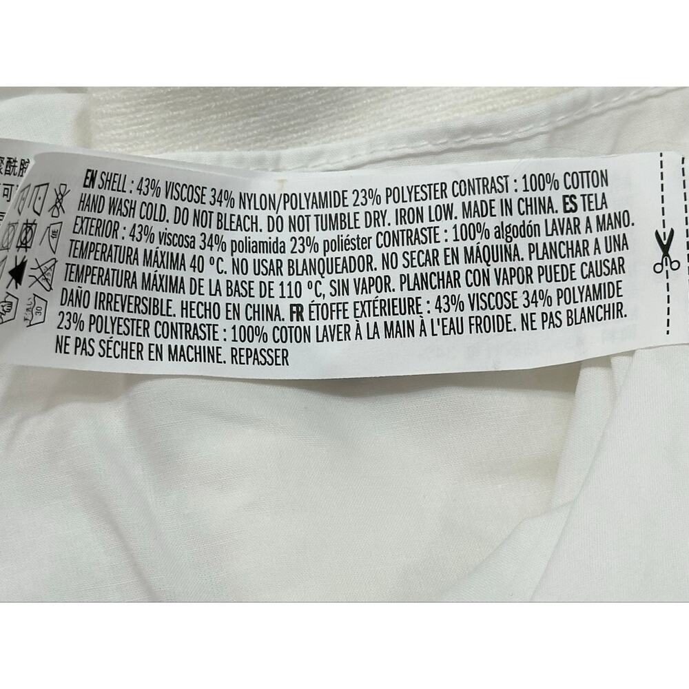 English Factory Creamy Ivory Ruffle Hem Long Sleeve Knit Sweater Top Size Small - Picture 8 of 8